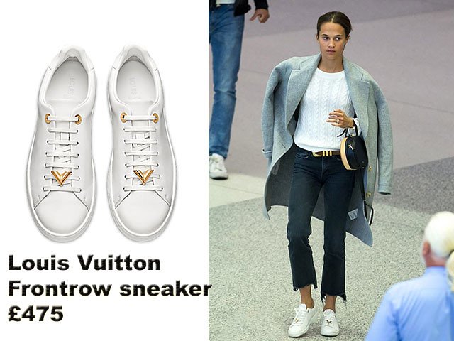 Alicia Vikander in Louis Vuitton Frontrow sneaker, Mother Denim jeans & cable knit