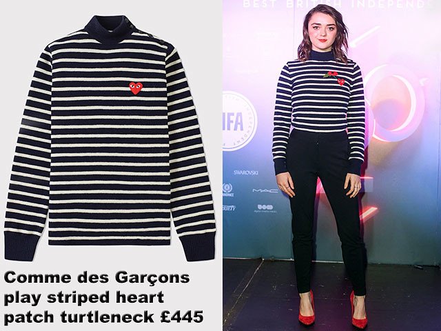 Maisie Williams in Comme des Garçons play striped heart patch turtleneck, pants & red heels