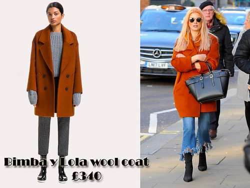 Ashley James in an orange Bimba y Lola brick crossed coat & a pair of frayed edges cropped jeans
