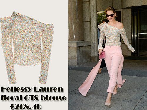Lily James in pink trousers with floor length streamers and a Hellessy Lauren floral off the shoulder blouse.